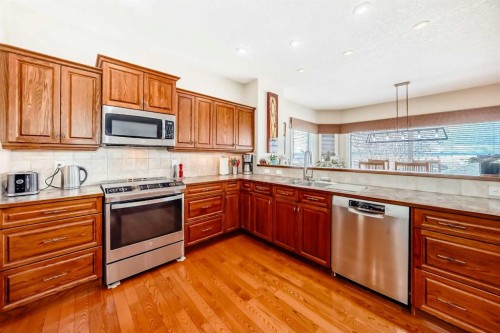 487 Rocky Ridge Drive Nw, Calgary, AB - Indoor Photo Showing Kitchen With Stainless Steel Kitchen