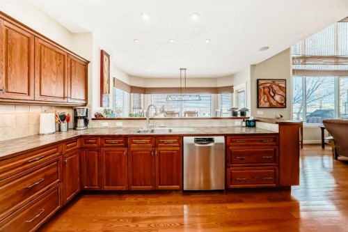 487 Rocky Ridge Drive Nw, Calgary, AB - Indoor Photo Showing Kitchen With Double Sink