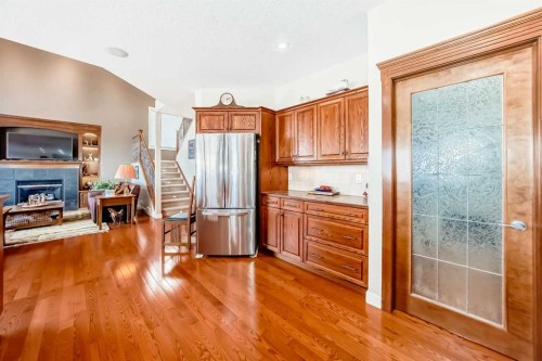 487 Rocky Ridge Drive Nw, Calgary, AB - Indoor With Fireplace