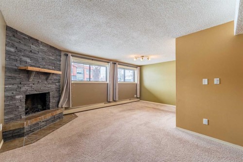 135 27 Avenue Ne, Calgary, AB - Indoor With Fireplace
