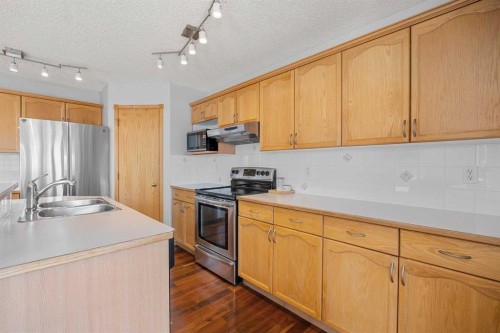 136 Coral Springs Landing Ne, Calgary, AB - Indoor Photo Showing Kitchen With Double Sink