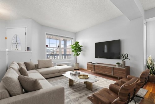 136 Coral Springs Landing Ne, Calgary, AB - Indoor Photo Showing Living Room