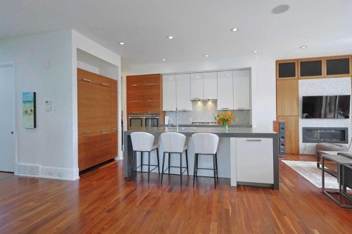 1707 Broadview Road Nw, Calgary, AB - Indoor Photo Showing Kitchen With Fireplace With Upgraded Kitchen
