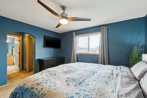515 Stonegate Road Nw, Airdrie, AB - Indoor Photo Showing Bedroom