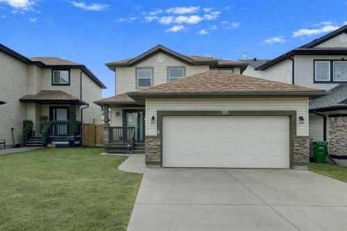 515 Stonegate Road Nw, Airdrie, AB - Outdoor With Facade