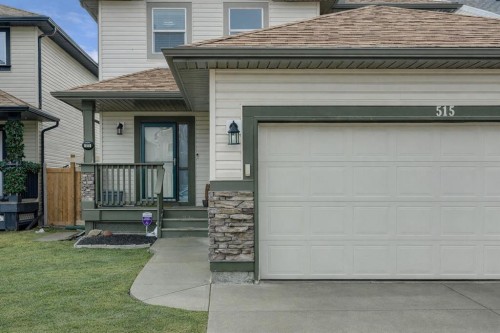 515 Stonegate Road Nw, Airdrie, AB - Outdoor With Deck Patio Veranda With Exterior