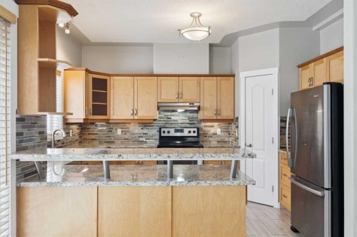 39 Sierra Morena Landing Sw, Calgary, AB - Indoor Photo Showing Kitchen With Stainless Steel Kitchen