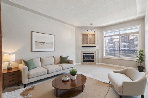 39 Sierra Morena Landing Sw, Calgary, AB - Indoor Photo Showing Living Room With Fireplace