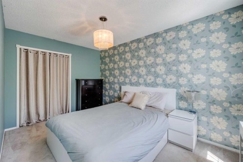 103 Riverview Circle Se, Calgary, AB - Indoor Photo Showing Bedroom
