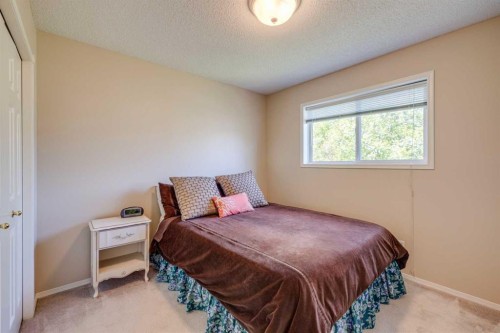 103 Riverview Circle Se, Calgary, AB - Indoor Photo Showing Bedroom