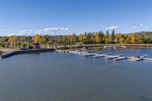 602 Pheasant Close, Pelican Point, AB - Outdoor With Body Of Water With View