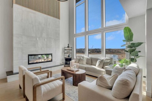 351 Lucas Way Nw, Calgary, AB - Indoor Photo Showing Living Room With Fireplace