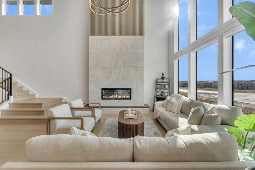 351 Lucas Way Nw, Calgary, AB - Indoor Photo Showing Living Room With Fireplace