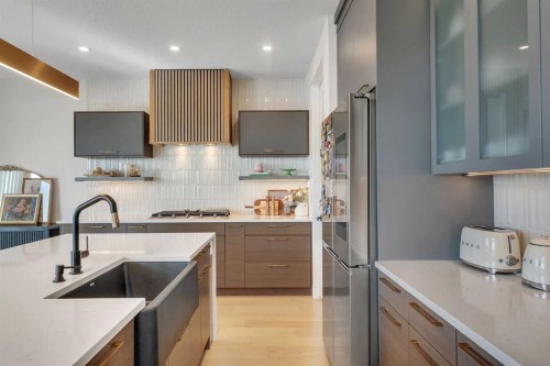 351 Lucas Way Nw, Calgary, AB - Indoor Photo Showing Kitchen With Upgraded Kitchen