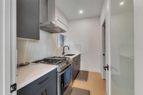 351 Lucas Way Nw, Calgary, AB - Indoor Photo Showing Kitchen With Upgraded Kitchen