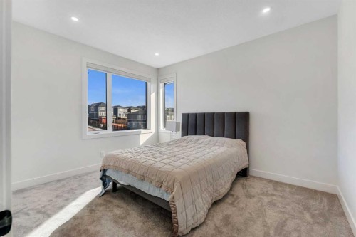 351 Lucas Way Nw, Calgary, AB - Indoor Photo Showing Bedroom