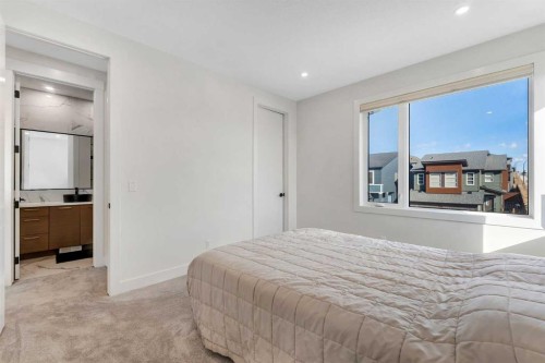 351 Lucas Way Nw, Calgary, AB - Indoor Photo Showing Bedroom