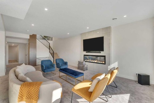 351 Lucas Way Nw, Calgary, AB - Indoor Photo Showing Living Room With Fireplace