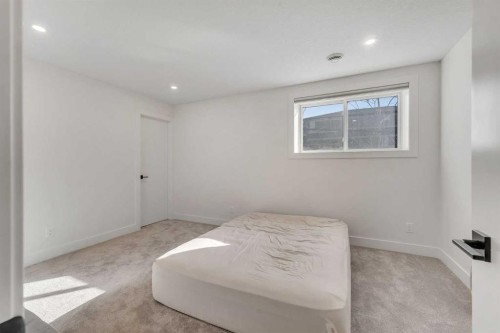 351 Lucas Way Nw, Calgary, AB - Indoor Photo Showing Bedroom