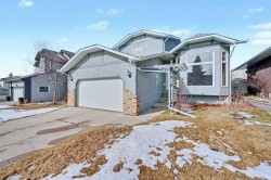82 Wood Valley Drive SW Calgary, AB T2W 5V6