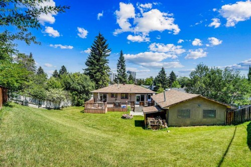 52 Harrow Crescent Sw, Calgary, AB - Outdoor With Deck Patio Veranda With View