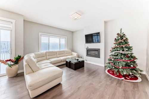 144 Nolancrest Circle Nw, Calgary, AB - Indoor Photo Showing Living Room With Fireplace