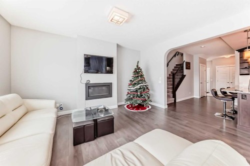 144 Nolancrest Circle Nw, Calgary, AB - Indoor Photo Showing Living Room With Fireplace
