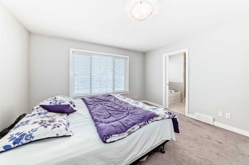144 Nolancrest Circle Nw, Calgary, AB - Indoor Photo Showing Bedroom