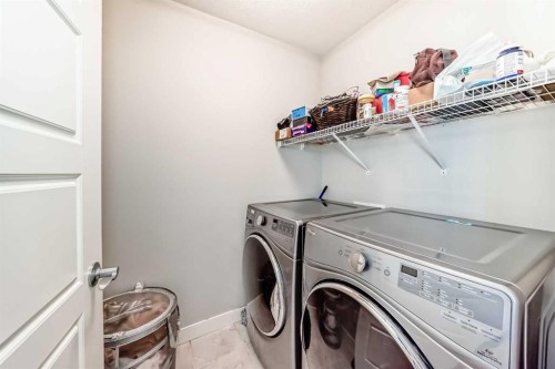 144 Nolancrest Circle Nw, Calgary, AB - Indoor Photo Showing Laundry Room