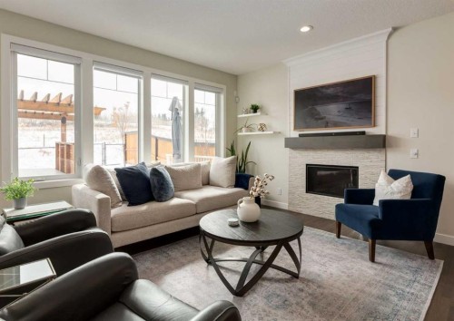 60 Crestbrook View Sw, Calgary, AB - Indoor Photo Showing Living Room With Fireplace