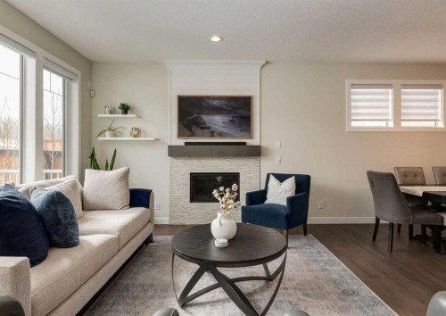 60 Crestbrook View Sw, Calgary, AB - Indoor Photo Showing Living Room With Fireplace