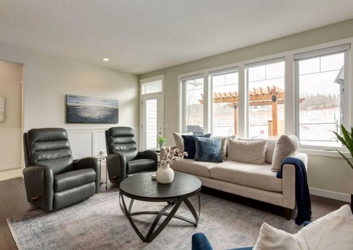 60 Crestbrook View Sw, Calgary, AB - Indoor Photo Showing Living Room
