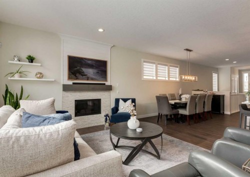 60 Crestbrook View Sw, Calgary, AB - Indoor Photo Showing Living Room With Fireplace