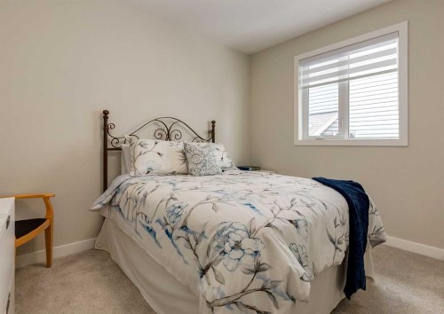 60 Crestbrook View Sw, Calgary, AB - Indoor Photo Showing Bedroom