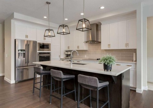 60 Crestbrook View Sw, Calgary, AB - Indoor Photo Showing Kitchen With Upgraded Kitchen