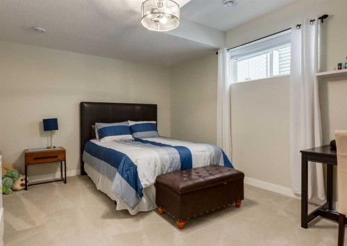 60 Crestbrook View Sw, Calgary, AB - Indoor Photo Showing Bedroom