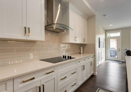 60 Crestbrook View Sw, Calgary, AB - Indoor Photo Showing Kitchen With Upgraded Kitchen