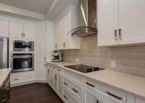 60 Crestbrook View Sw, Calgary, AB - Indoor Photo Showing Kitchen With Upgraded Kitchen