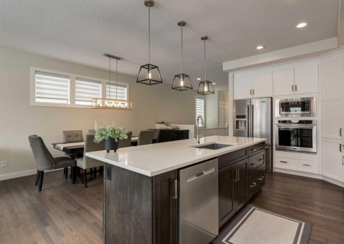 60 Crestbrook View Sw, Calgary, AB - Indoor Photo Showing Kitchen With Upgraded Kitchen