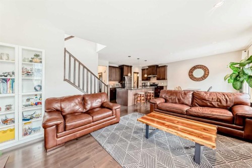 691 Panamount Boulevard Nw, Calgary, AB - Indoor Photo Showing Living Room