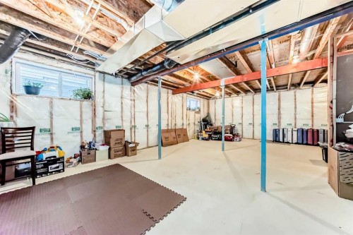 691 Panamount Boulevard Nw, Calgary, AB - Indoor Photo Showing Basement