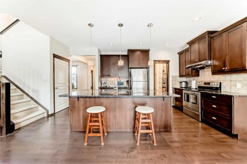 691 Panamount Boulevard Nw, Calgary, AB - Indoor Photo Showing Kitchen With Upgraded Kitchen