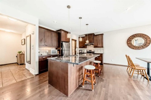 691 Panamount Boulevard Nw, Calgary, AB - Indoor Photo Showing Kitchen With Stainless Steel Kitchen With Upgraded Kitchen