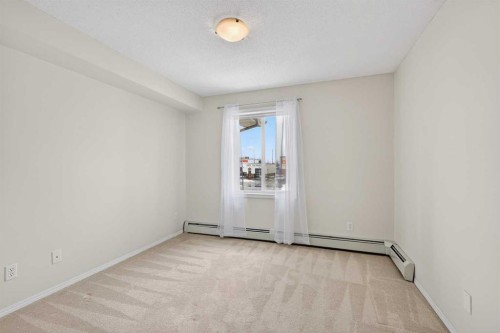 1307-2395 Eversyde Avenue Se, Calgary, AB - Indoor Photo Showing Other Room