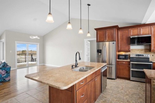 31017 Range Road 23, Rural Mountain View County, AB - Indoor Photo Showing Kitchen With Double Sink