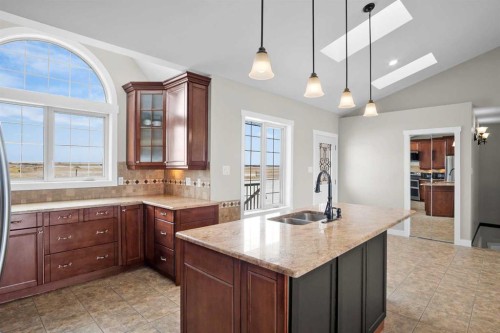 31017 Range Road 23, Rural Mountain View County, AB - Indoor Photo Showing Kitchen With Double Sink