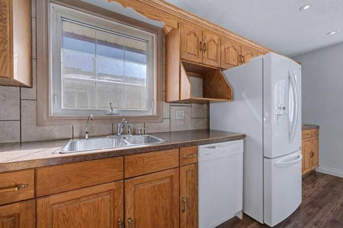 1607 Marlyn Way Ne, Calgary, AB - Indoor Photo Showing Kitchen With Double Sink