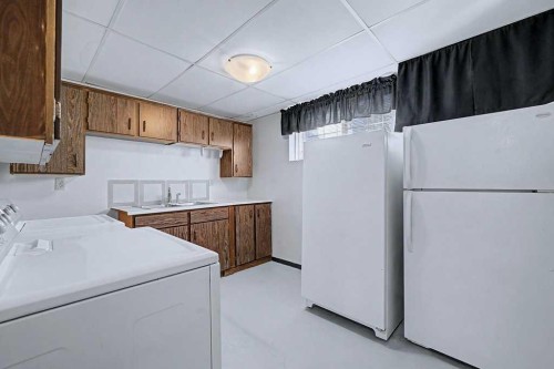 1607 Marlyn Way Ne, Calgary, AB - Indoor Photo Showing Laundry Room