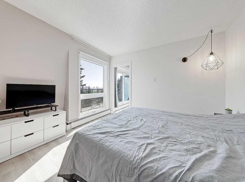 302-332 Cedar Crescent Sw, Calgary, AB - Indoor Photo Showing Bedroom