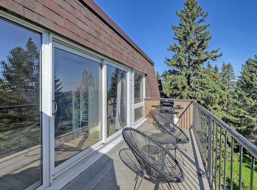 302-332 Cedar Crescent Sw, Calgary, AB - Outdoor With Balcony